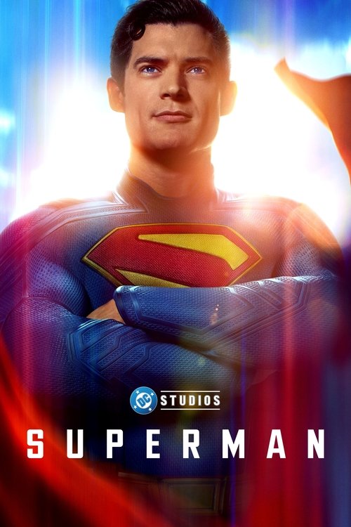 Promotional poster for a Superman movie featuring the superhero in a vibrant blue and red suit, confidently standing with his arms crossed, against a brightly lit, colorful background. The logo of DC Studios and the title "SUPERMAN" are prominently displayed.